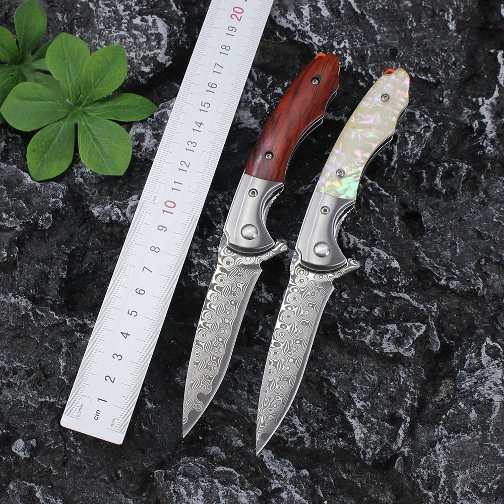 

DM014 Damascus steel Knife Ball bearing Folding Hunting Tactical combat Folding Pocket Knives white shell /rosewood Handle Knife