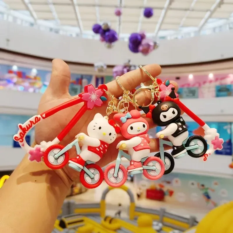 Sanrio Hello Kitty My Melody Kuromi Cinnamoroll Ride Bike Series Cute Toy Keychains Doll Bag Pendant Accessories Kids Gift