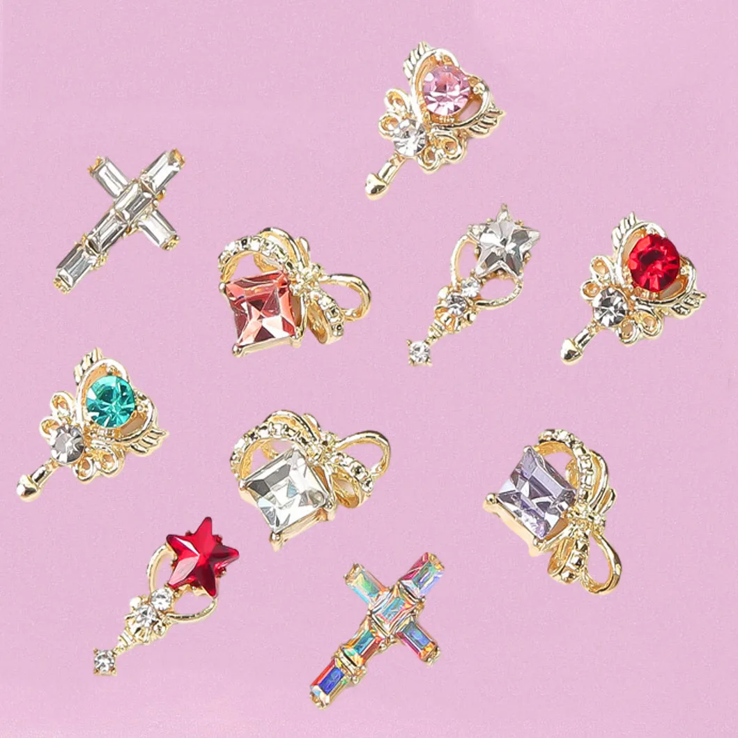 ชุดอุปกรณ์ตกแต่งเล็บ 22 ชิ้น ประดับด้วยอัญมณีหลากสีสัน รูปดาว/กากบาทสีทอง 3 มิติ สำหรับตกแต่งเล็บสไตล์สาวหวาน พร้อมจี้ห้อยและเพชรปลอม