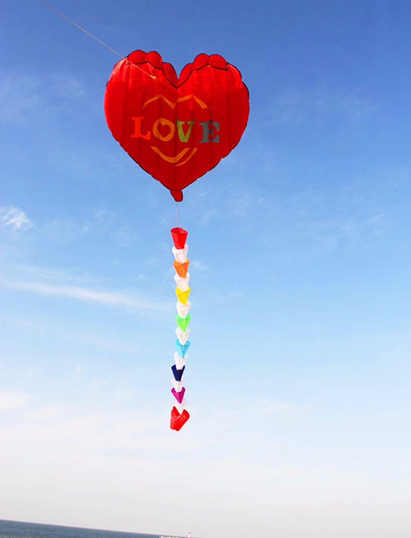 จัดส่งฟรีInflatable Kites Heart Kitesของเล่นกลางแจ้งสําหรับผู้ใหญ่Weifang KitesโรงงานลมKitesสําหรับผู้สูงอายุลมสายไฟ