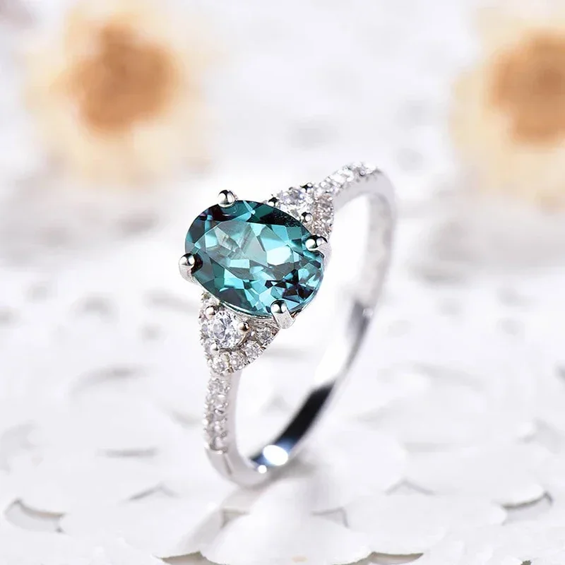 Huitan Luxuriöse ovale blaue Zirkonia-Ringe, bezaubernd, hell, anmutig, Finger-Accessoires für Frauen, zarter Schmuck für Party