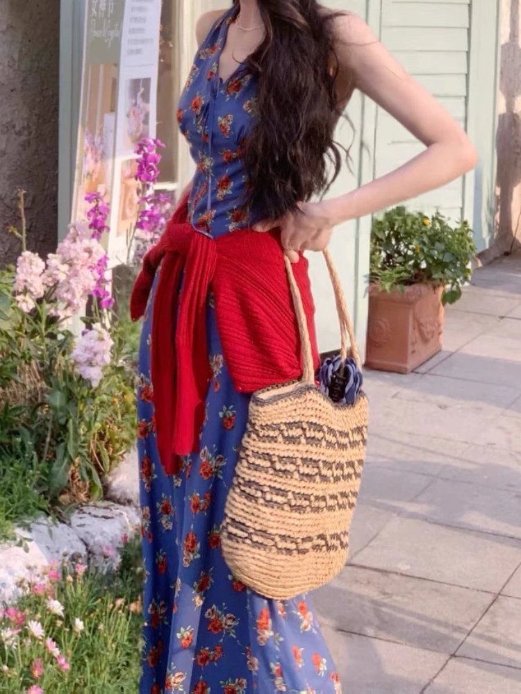 Abito floreale da donna con atmosfera di temperamento dimagrante con scollo a V blu in stile retrò Hong Kong