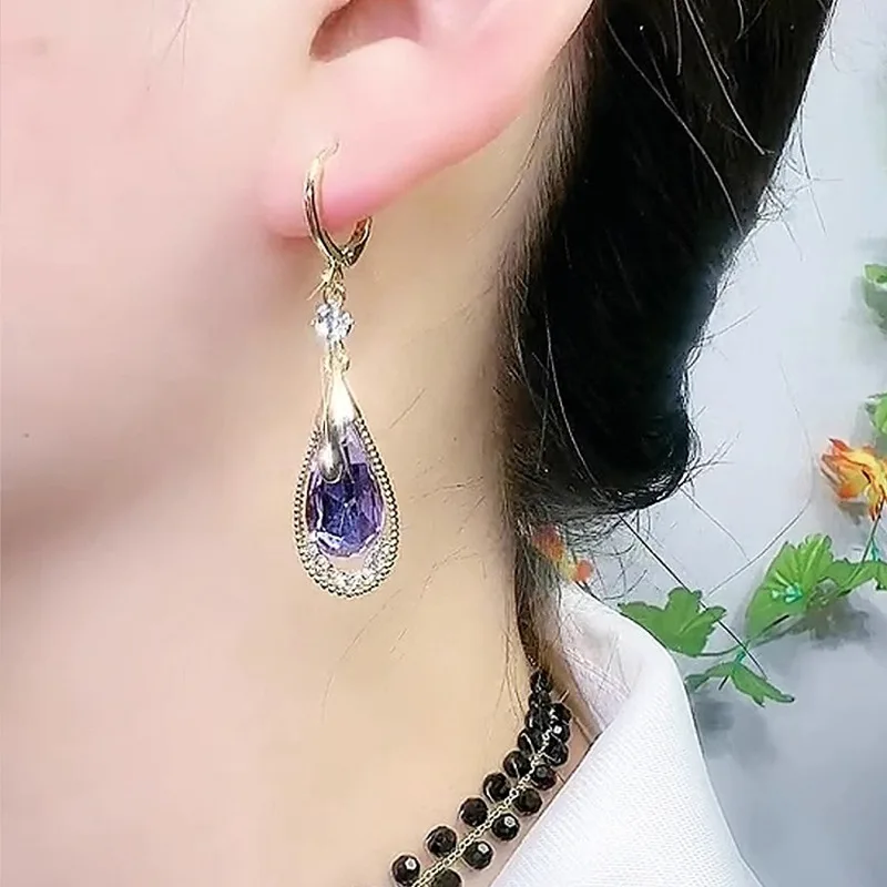 Boucles d\'oreilles en forme de goutte de cristal violet clair pour femmes, bijoux de fête exquis, cadeau de luxe, design unique, élégant, tendance