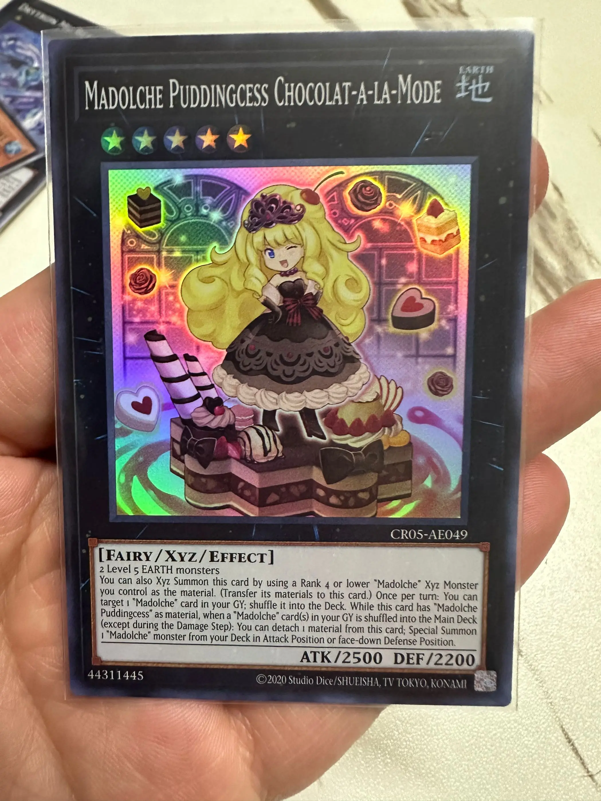 

Yugioh KONAMI Duel Monsters CR05-AE049 Madolche Puddingcess Chocolat-a-la-Mode Super Rare Asian English Collection Mint Card