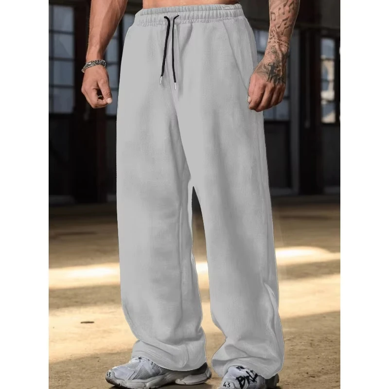

Autumn and Winter Loose Fitting Unisex and Street Casual Solid Color Straight Leg Sports Pants Are Suitable for All Seasons