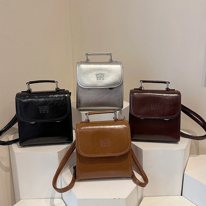 

Stylish Designer Paris Fashion Inspired Crossbody Handbag For Women With Minimalist Vintage Look And Logo
