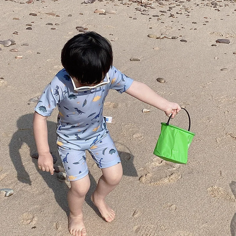 Bañador de una pieza para niños, traje de baño de manga corta con protección solar, traje de surf de dinosaurio de dibujos animados, traje de baño para niños pequeños