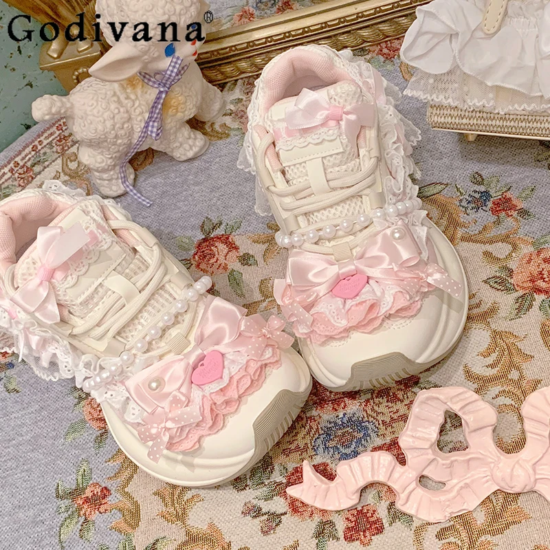 المرأة الارتفاع زيادة أحذية رياضية كاجوال الأصلي مقوس دانتيل اللؤلؤ الشريط أحذية الإناث لطيف الحلو سميكة سوليد لوليتا الأحذية