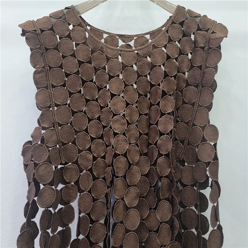 ANJY 2026 primavera nueva moda mujer 2 piezas conjunto diseño único gancho flor encaje hueco Top tendencia Chic Ins Streetwear falda A16972