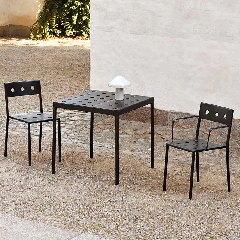 Modern and minimalist outdoor courtyard dining table, coffee shop, cave table, outdoor space, hotel, homestay, leisure table