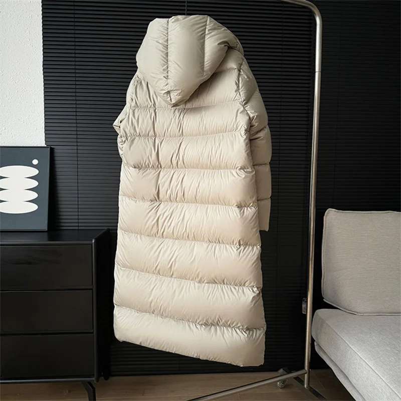 2025 invierno nuevo abrigo con capucha de plumón de pato blanco chaqueta de plumas gruesa y esponjosa coreana para mujer abrigo largo a prueba de viento para mujer