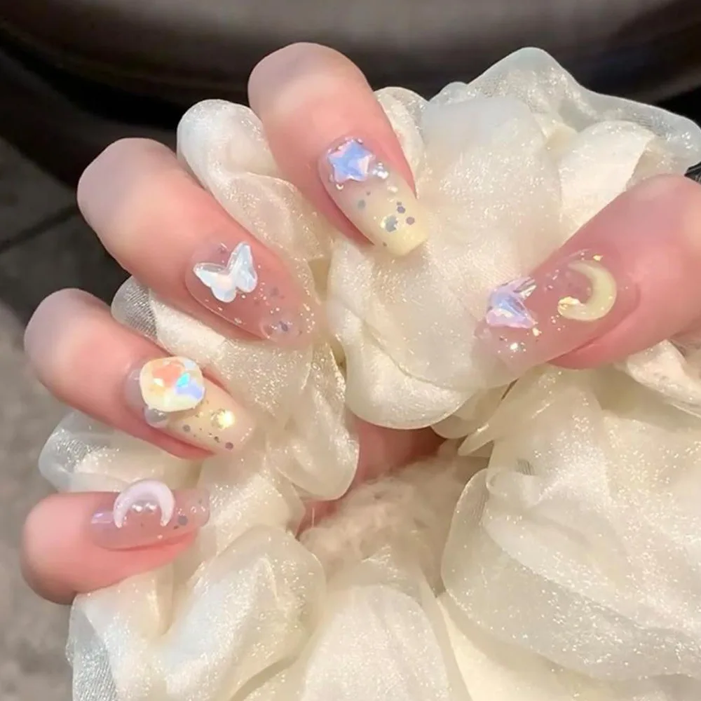 

2026 New Simple Nude Star, Moon, and Butterfly Glitter Nail Art - Dreamy Wearable Nail Art with Hearts, Pearls, and Rhinestones