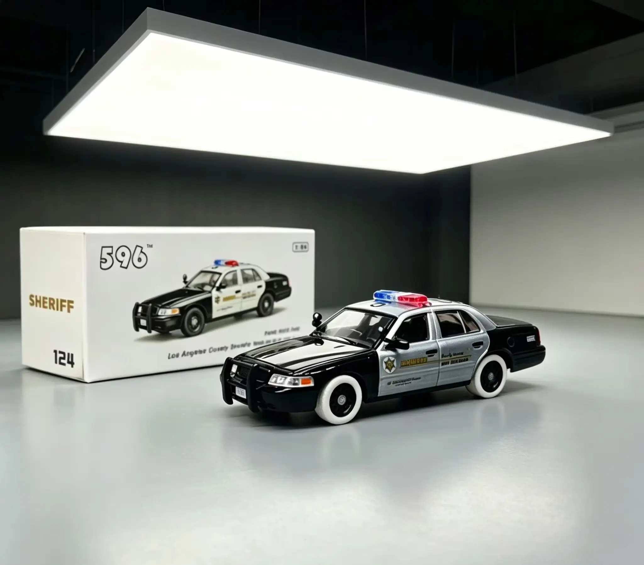 

596 1:64 Scale Ford Crown Victoria LASD Police Car 596-124 Clear Coat White Wheels