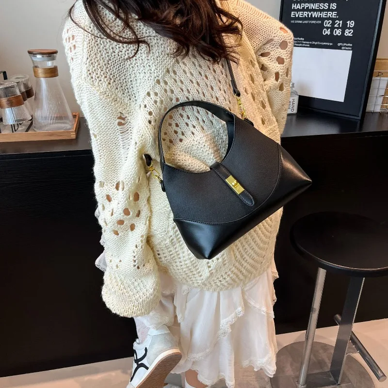 

High End Contrasting Color Niche Design Bag for Women 2026 New Versatile Commuting Handheld Crossbody Armpit Bag