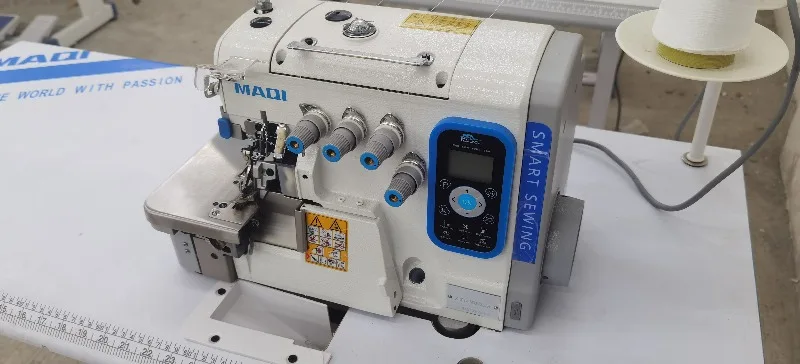 Meiji X10Tf stepper computerized four-thread overlock sewing machine