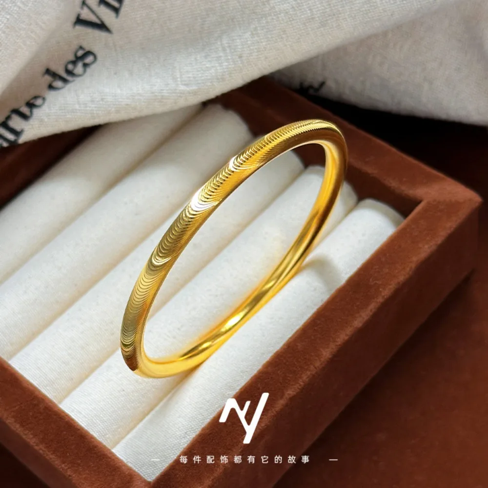Light luxury design sense vitage niche design sense explosion flash net red cnc cat eye element circle inheritance 9999gold