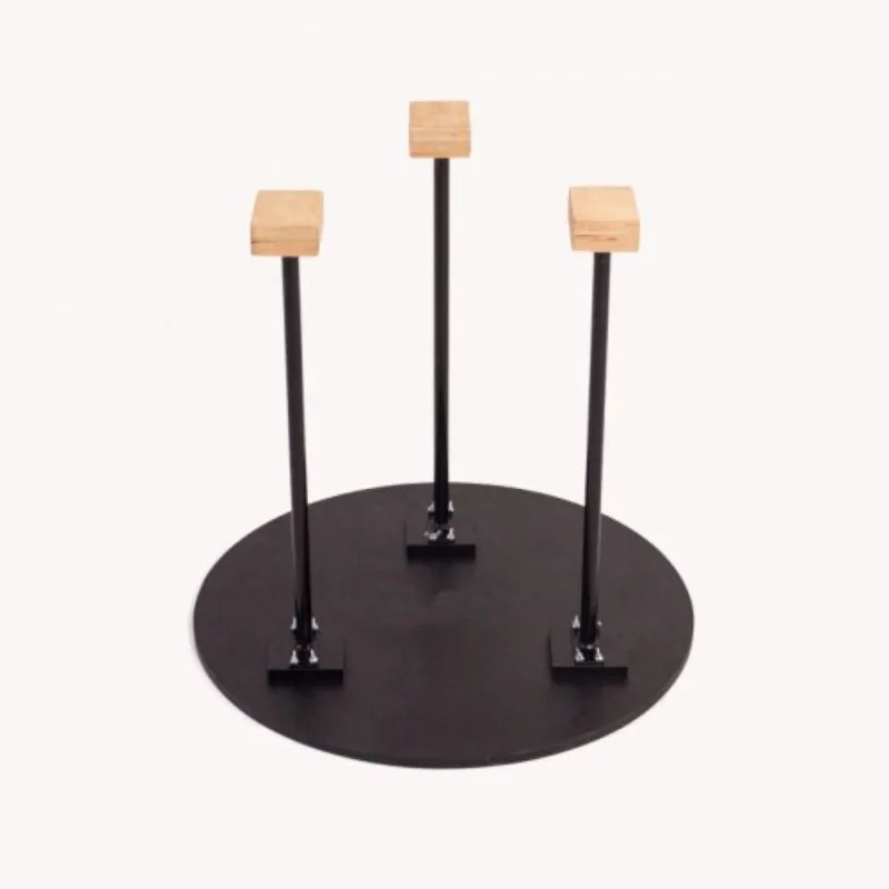 A sturdy balance training device with a triple inverted cane for gymnastics, used for strength and stability exercises