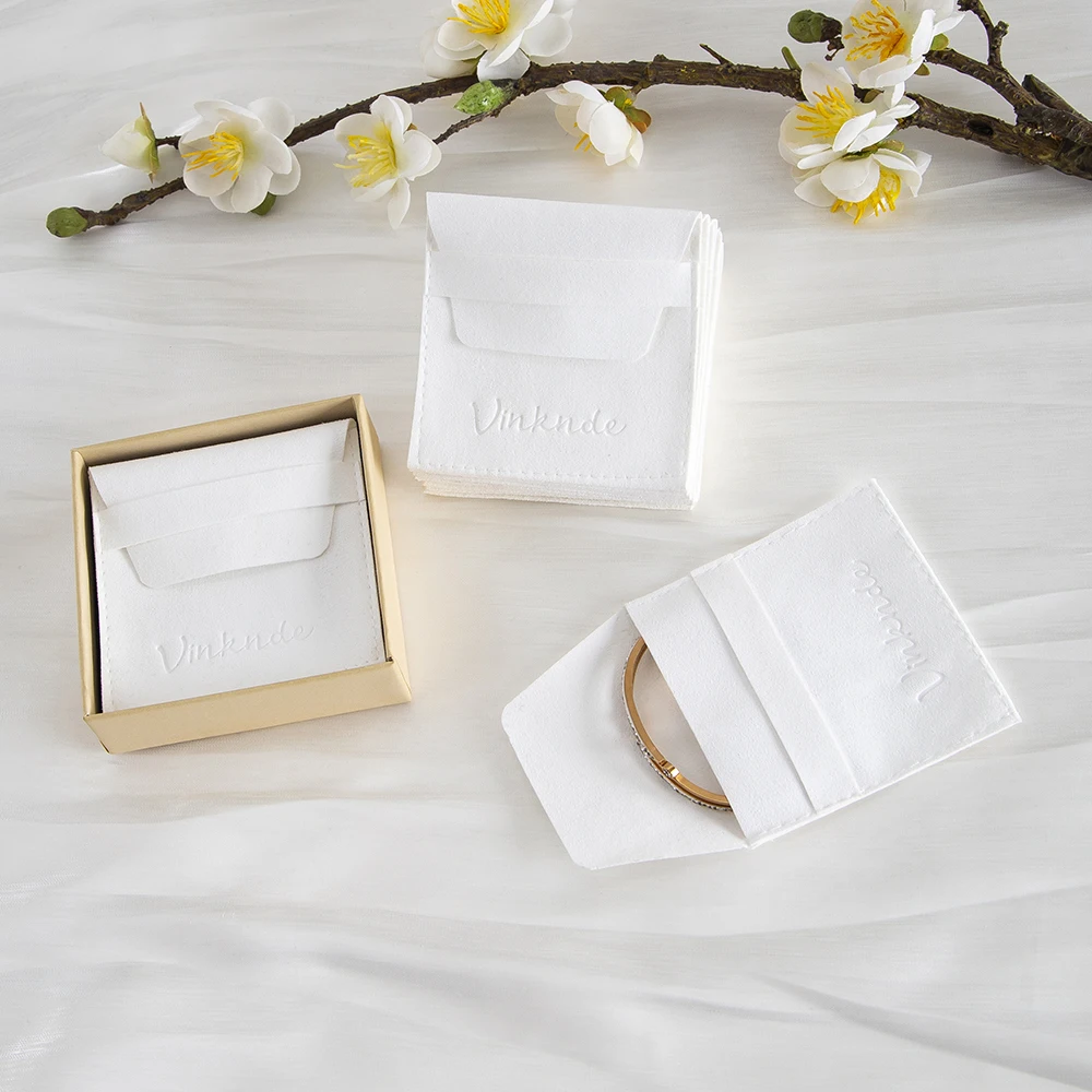 

50 шт./лот, сумки для упаковки ювелирных изделий из микрофибры, сумка для сережек и колец, модная умная брендовая сумка для ювелирных изделий с логотипом, подарочный клапан, пылесборник