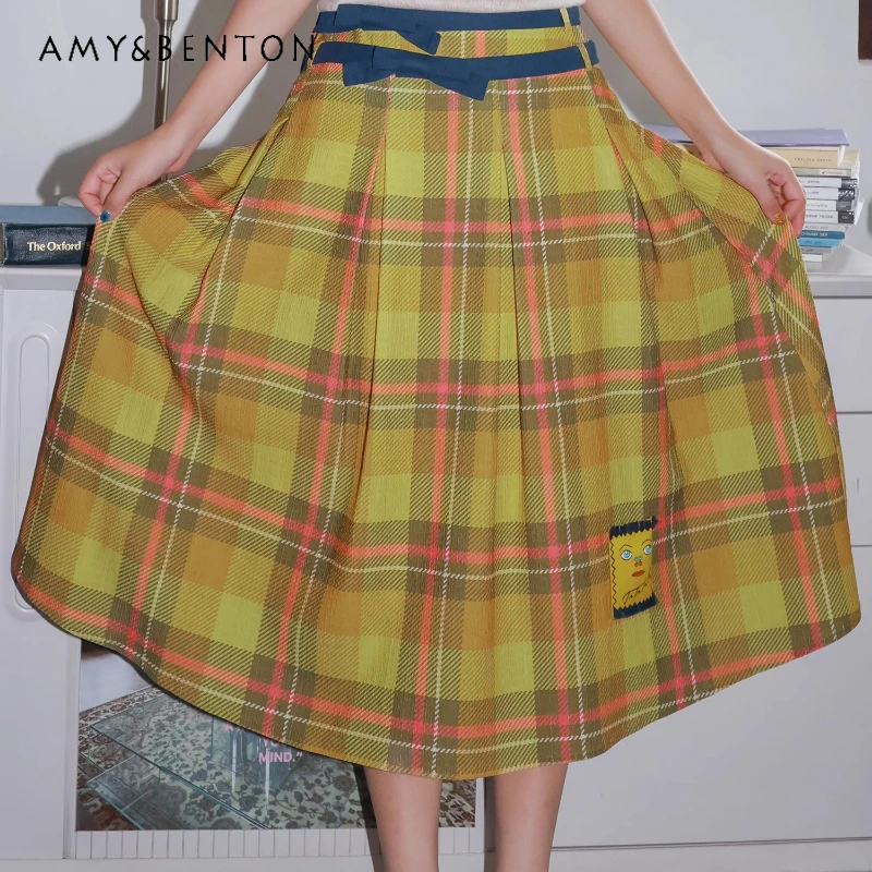 

2025 Autumn Winter New Yellow Plaid Bow Double Belt Women's Pleated Skirt Vintage Design Loose Elegant Versatile Skirts Ladies