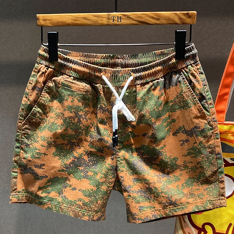 Shorts casuais de quatro pontos camuflados masculinos, calças de praia soltas, marca fina da moda, moda que combina com tudo, verão