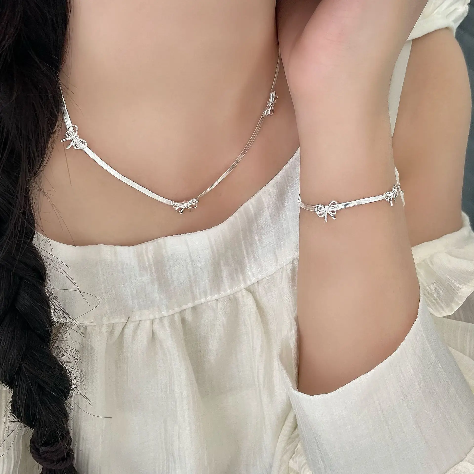 

Light luxury ins high-end niche design new versatile S925 sterling silver snake bone bow bracelet necklace