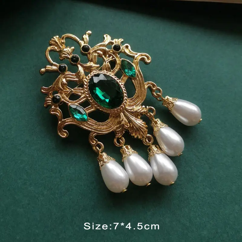 

Vintage court grandmother green gem pearl baroque brooch