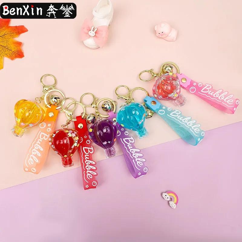 

2025 Minso Oil-filled sand hot air balloon keychain, car bag pendant, high-end small gift, key chain pendant