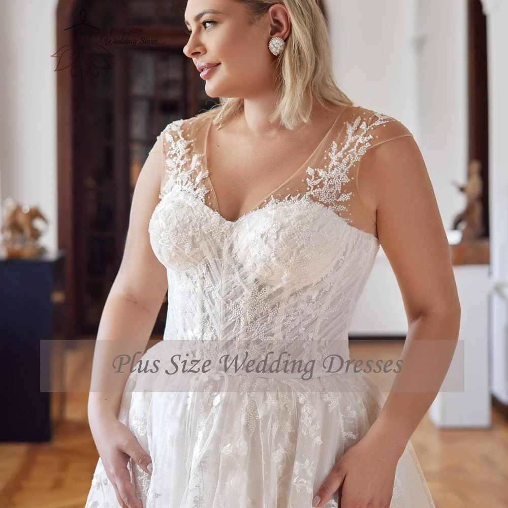 فساتين زفاف رائعة على شكل حرف a مقاس كبير ورقبة على شكل V وأكمام قصيرة فساتين العروس مزينة بالدانتيل طول الأرض تول فيستدو دي نويفا