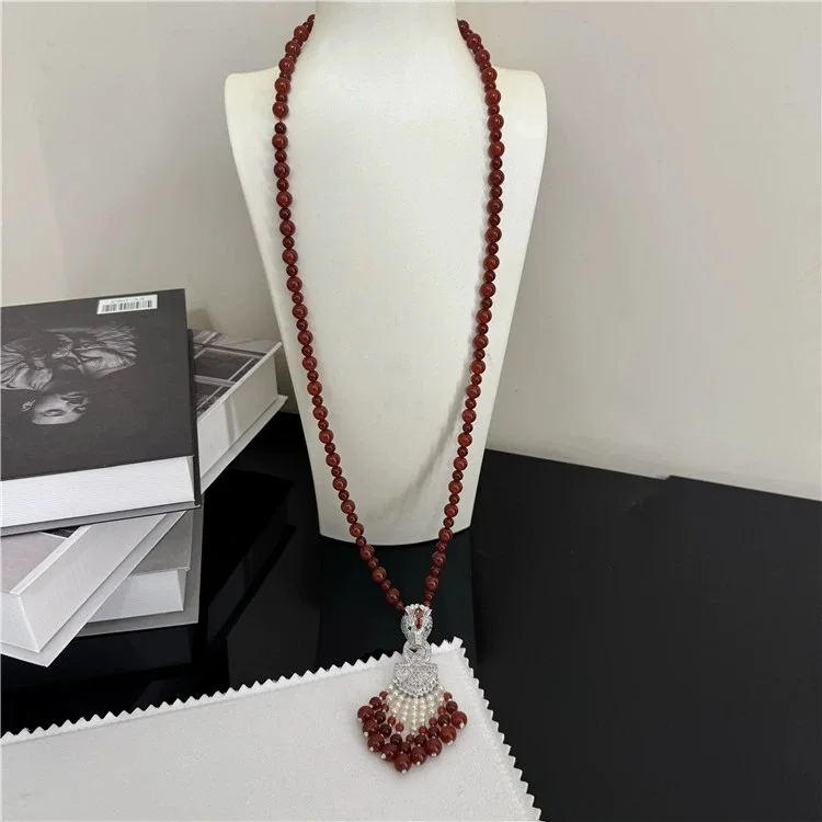 

Red Agate White Rice freshwater Pearl CZ Plated Pendant 32"