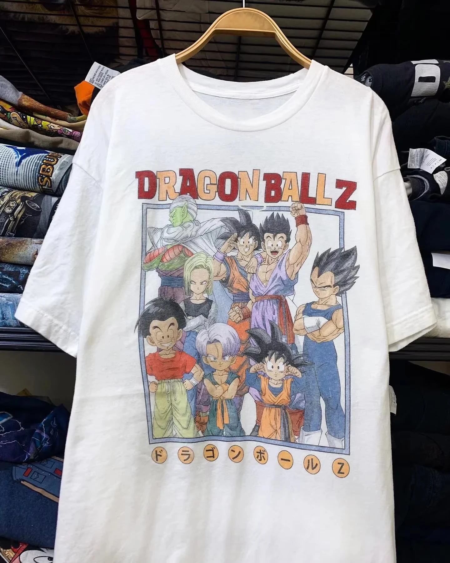 เสื้อยืดแขนสั้นลายการ์ตูนดราก้อนบอลญี่ปุ่นสำหรับผู้ชายและผู้หญิง คอลเลคชั่นใหม่ประจำปี 2026 สไตล์อเมริกันสุดเทรนดี้ ลำลอง เหมาะสำหรับพ่อแม่ลูก