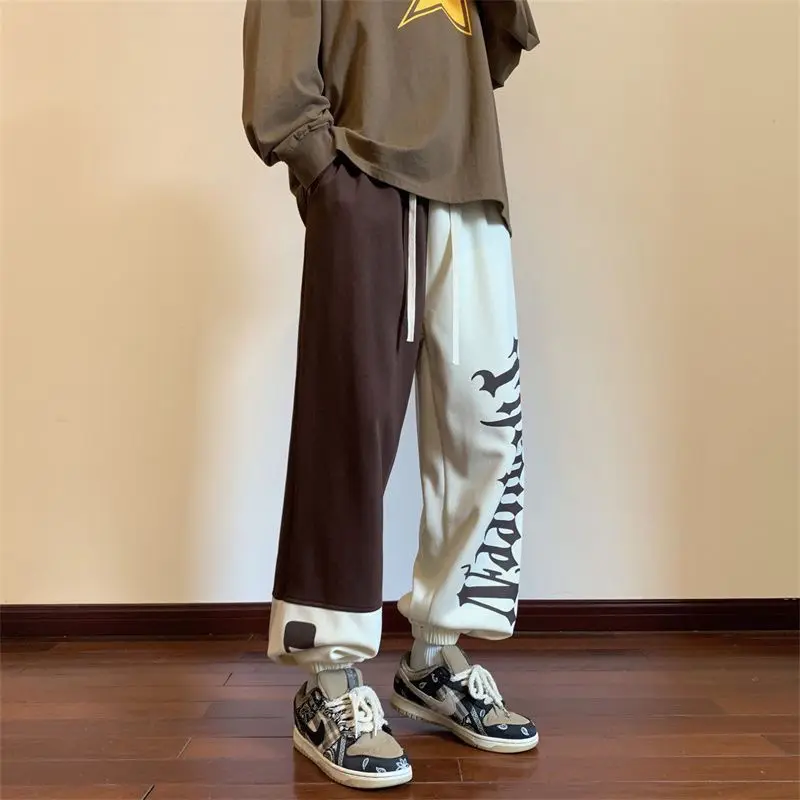 

Men's 2024 New Spliced Elasticized High-waisted Pocket Letter Fashion Loose and Versatile Minimalist Casual Sports Ankle Pants