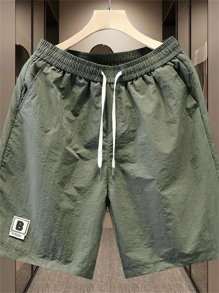 

Ice Silk Qui Dry Sports orts Men's Summer Thin Faion Trend Cool Feeling Qui Dry Casual Five-Quarter Pants Summer Wear