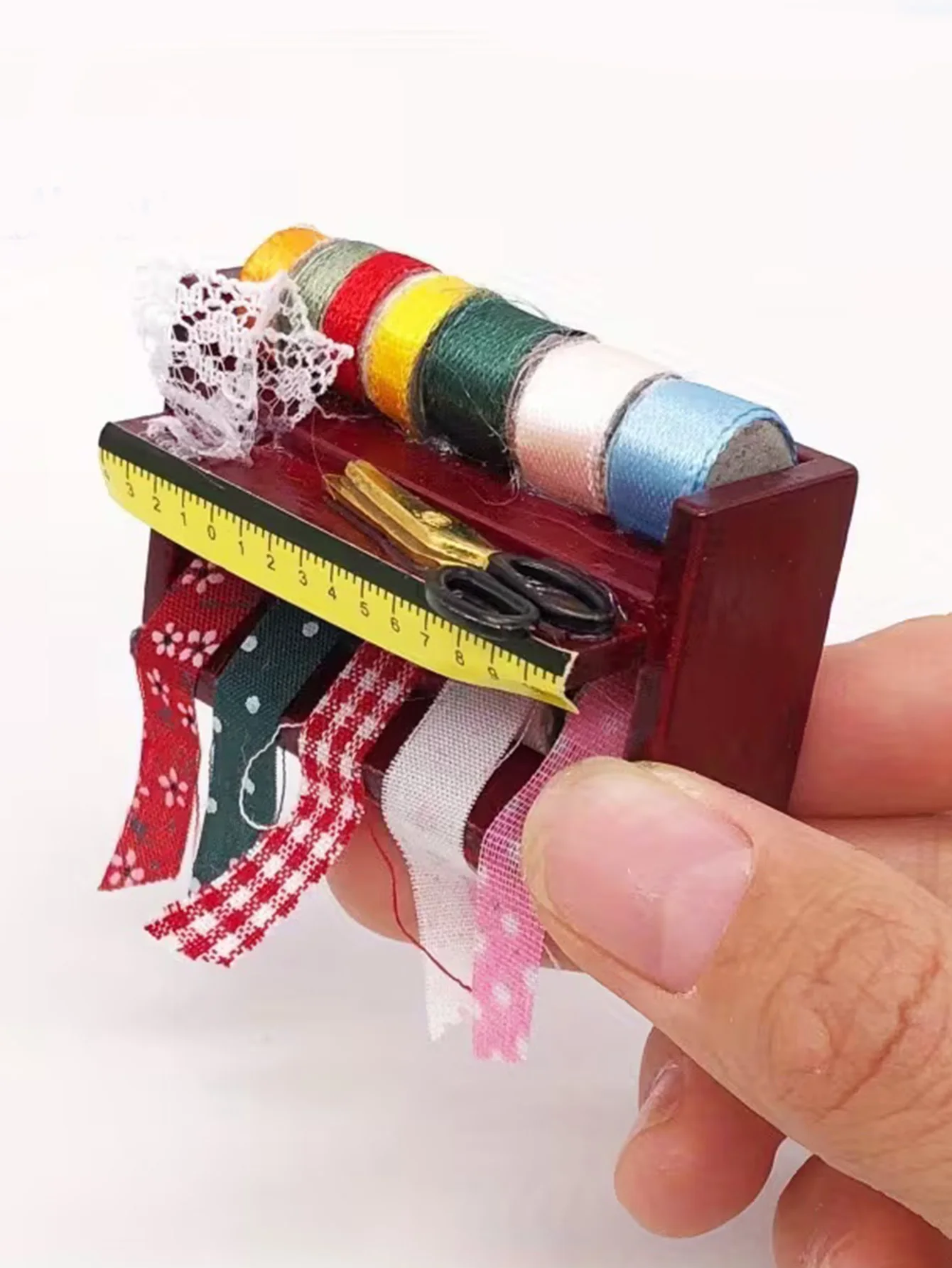 Dollhouse Mini Sewing Box with Lace Details. Ideal for Simulating a Sewing Scenario. With Some Colors Selected at Random. view 3