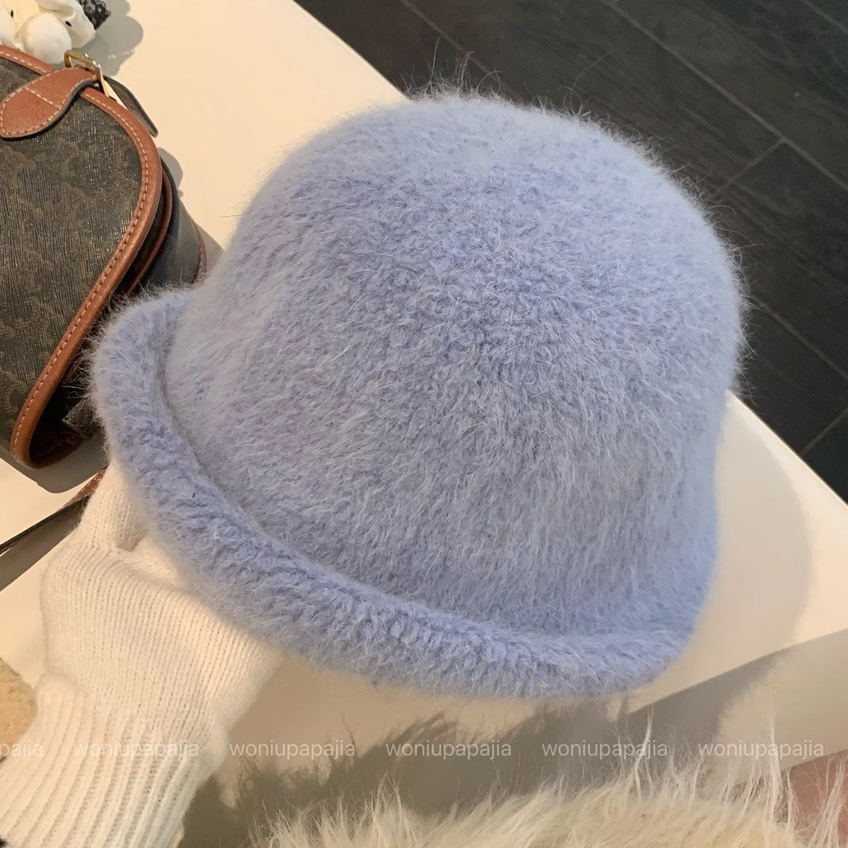 2025 السنة الجديدة الأرنب الفراء أفضل قبعة المرأة الخريف والشتاء الباردة واقية مجعد قبعة بحافة الدافئة الأبيض أفخم حوض قبعة