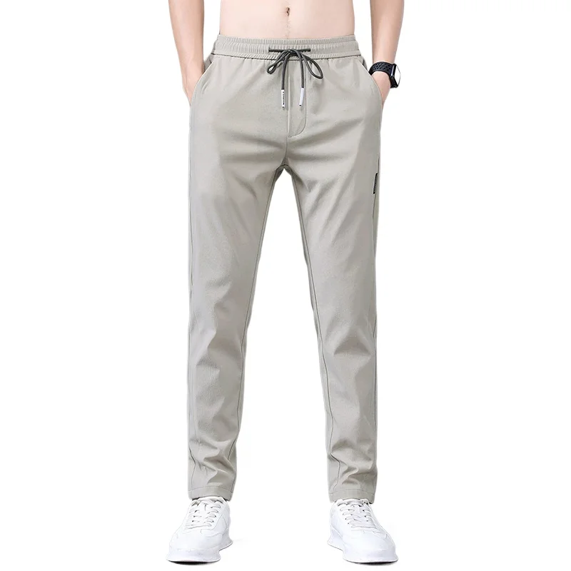 Pantaloni lunghi Casual da uomo nuovi pantaloni a matita Slim pantaloni dritti traspiranti moda maschile Stretch Khaki Jogging Streetwear uomo