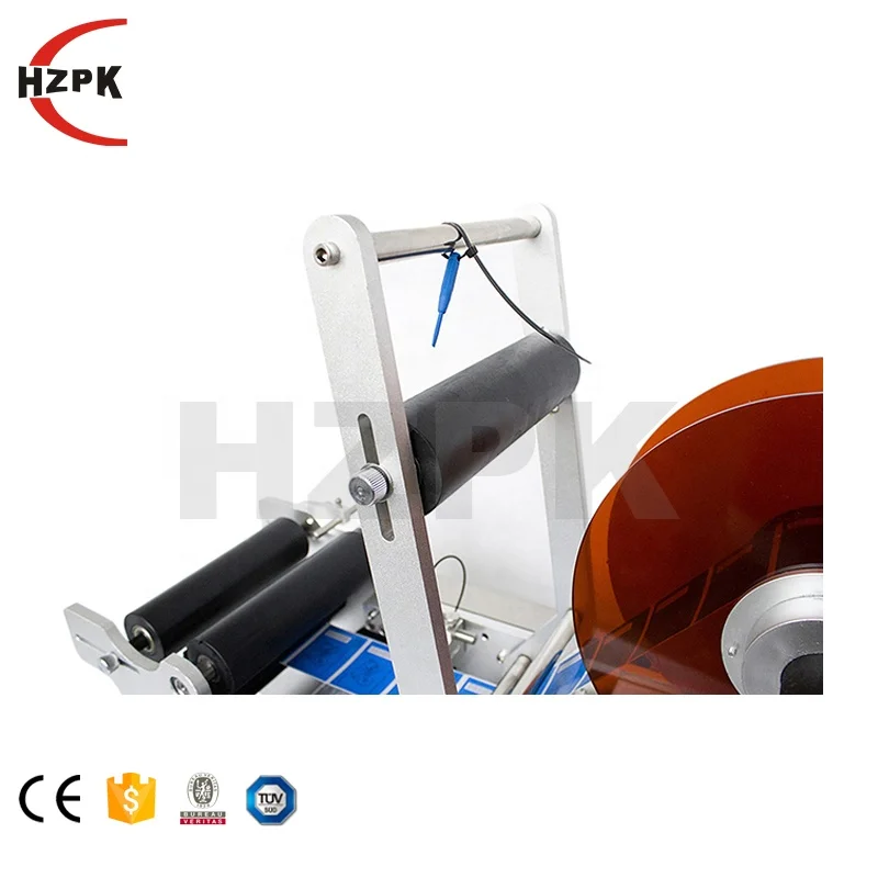 HZPK MT-50 กึ่งอัตโนมัติเดสก์ท็อปรอบแก้วสัตว์เลี้ยงขวดคู่มือ Self กาวเครื่องติดฉลากราคาขวด 20-120 มม.อลูมิเนียม