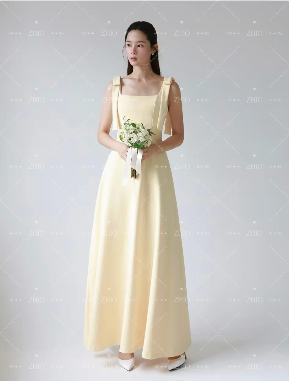 ชุดแต่งงานผ้าซาตินสีขาวเรียบง่าย สายเดี่ยวผูกโบว์ ชุดราตรีสไตล์เกาหลี สำหรับถ่ายภาพ ชุดเจ้าสาวสั่งตัด