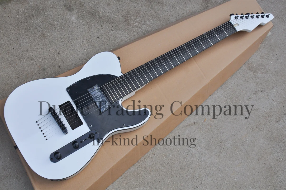 

7 string electric guitar White body neck Set In body Strings Though body Black fixed bridge Ebony fingerboard support customizat