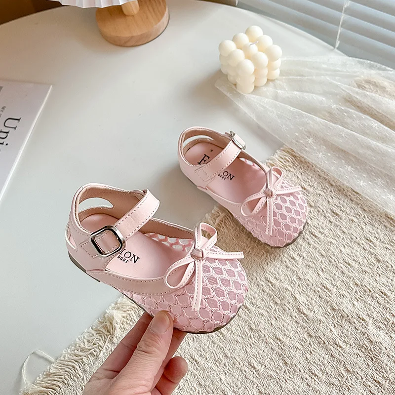 

Children Princess Sandals Hollowed-out Mesh Kids Beach Shoes Simple Bows 2026 Summer New Girls Sandals Versatile Korean Style