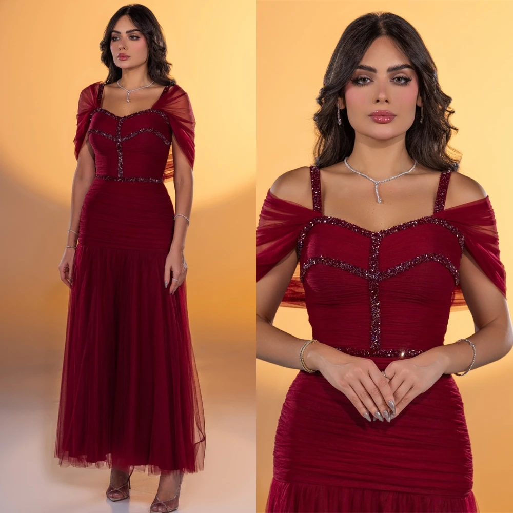 カスタマイズされたエレガントなスパゲッティストラップのイブニングドレスと気質オーガンザの特別な日のドレスとクラシックなビーズのプロムドレス