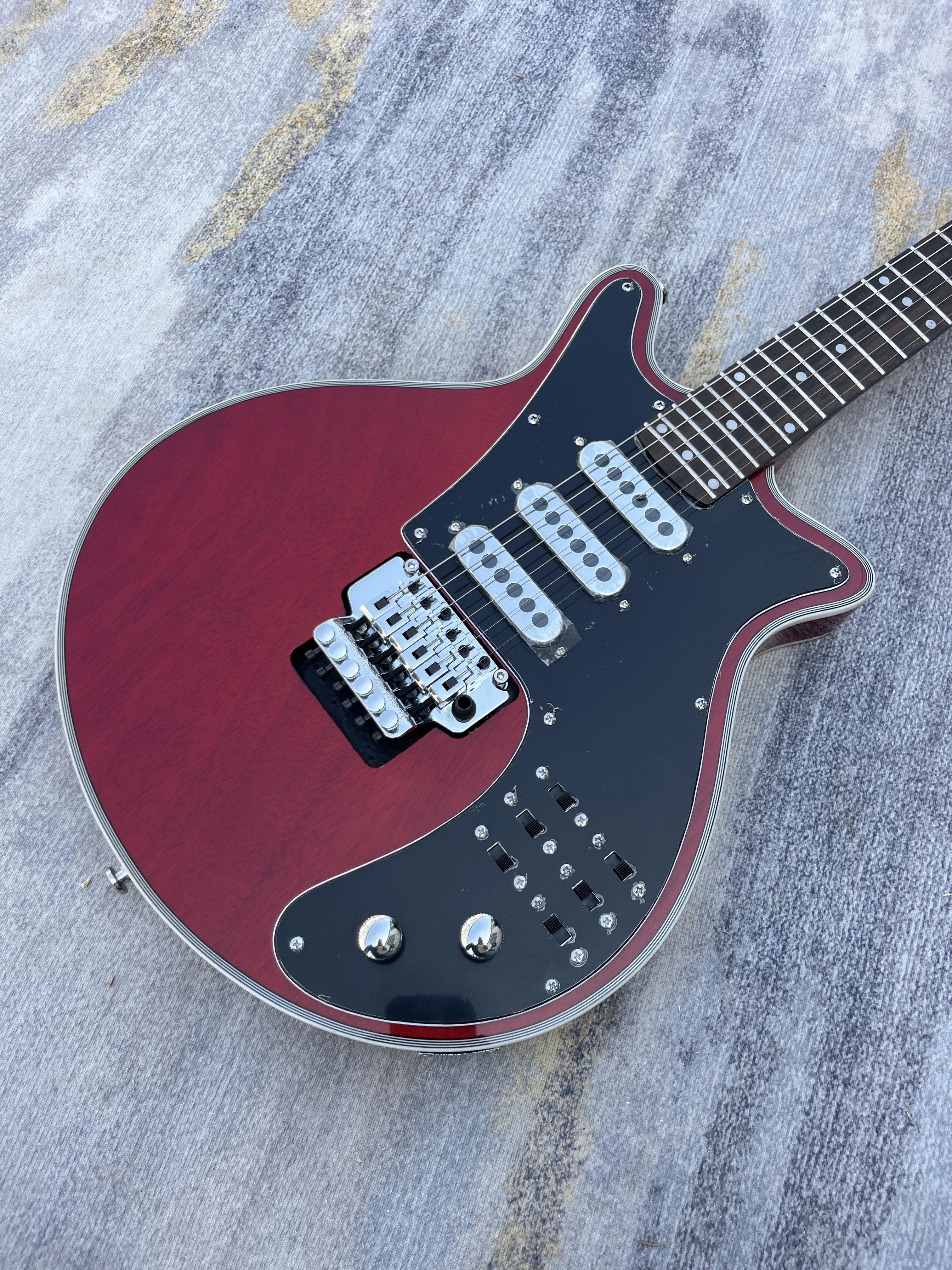 

Chinese Electric guitar red color Bran tremolo system May Rock Mahogany body and neck