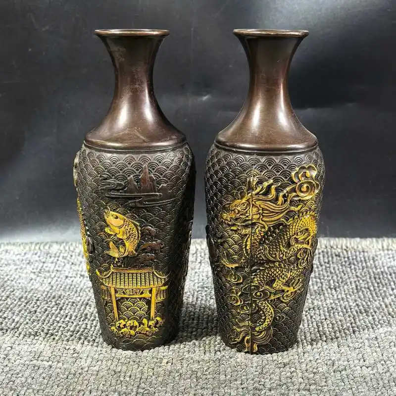 A pair of pure copper gilded relief vases with motif of a fish leaping over the dragon gate, symbolizing transformation into