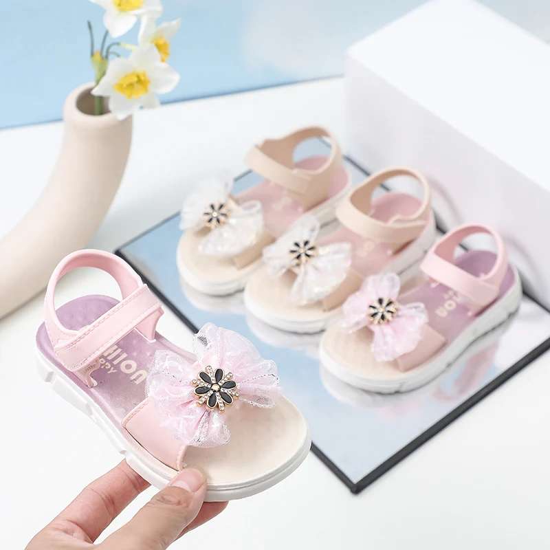 

Детские сандалии для девочек 2026: летние, из искусственной кожи, с мягкой подошвой, модные, нескользящие, с бантом, удобные, плоские, пляжные туфли для принцесс