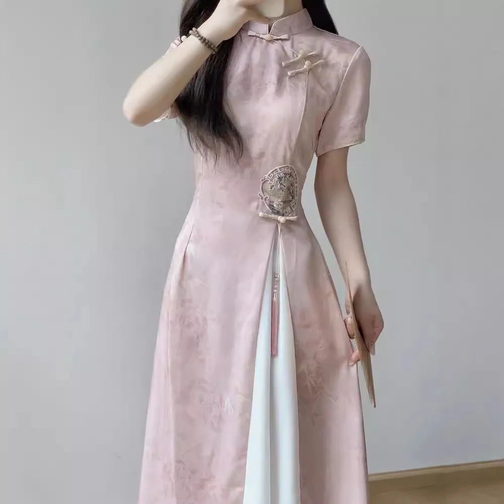 فساتين كلاسيكية ذات ياقة تشيسونغام الماندرين مطبوعة من تشيباو فساتين نسائية أنيقة متوسطة الطول على الطراز الصيني الجديد زي هانفو باللون الوردي