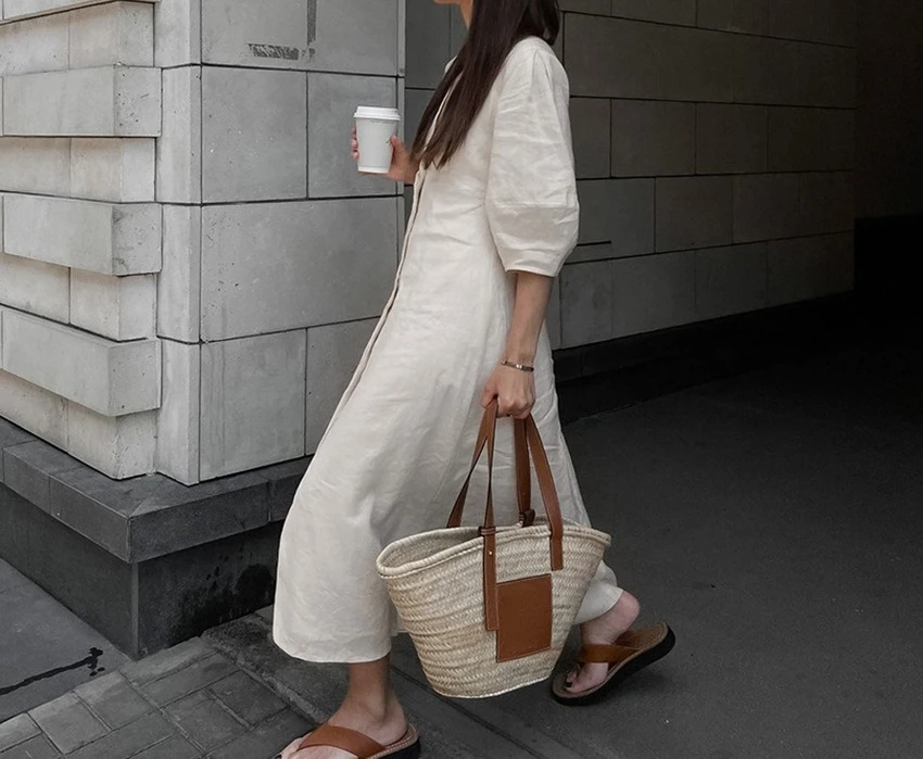 2025 Franse stijl licht volwassen beige linnen bubble mouw jurk dames zomer backless losse v-hals shirtjurk lange jurk