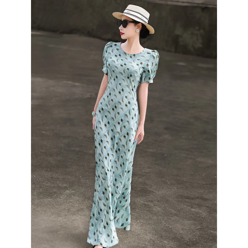 

MEXCOCO 2026 Summer Resort Elegant Round Neck Puff Sleeve Watercolor Leaf Print Slim Mermaid Maxi Beach Commuter Dress