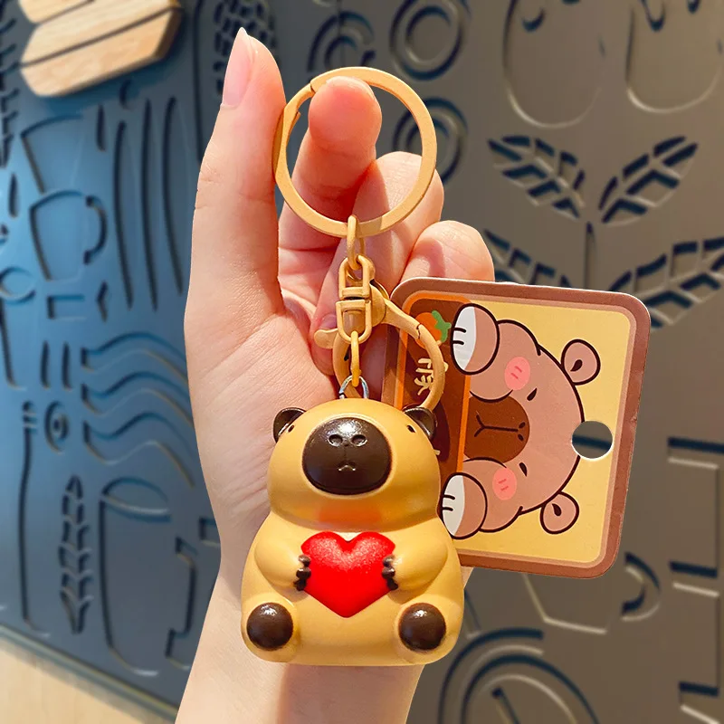 520การ์ตูนน่ารัก capybara Hug Love with Light Sound keychain ของเล่นเปล่งที่ห้อยไฟ