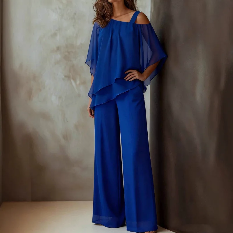 

Шифоновый комплект из двух предметов с рукавами «летучая мышь», блузка с короткими рукавами и асимметричным подолом, свободные брюки с широкими штанинами, летний комплект