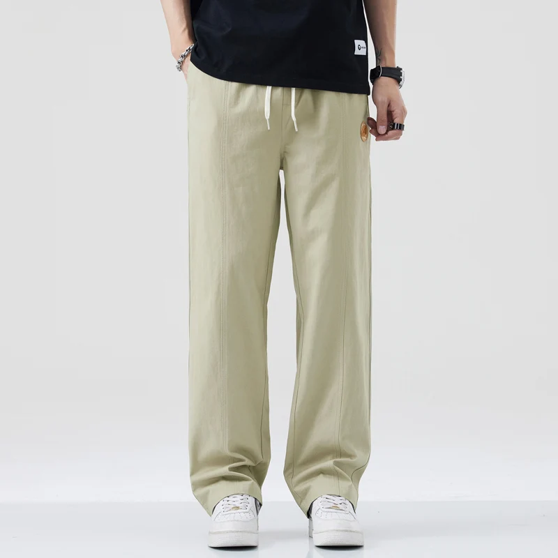 سراويل البضائع القطنية خفيفة الوزن للرجال ملابس الشارع فضفاضة بأرجل مستقيمة في الهواء الطلق كاجوال متعددة الجيوب مع حزام خصر مرن