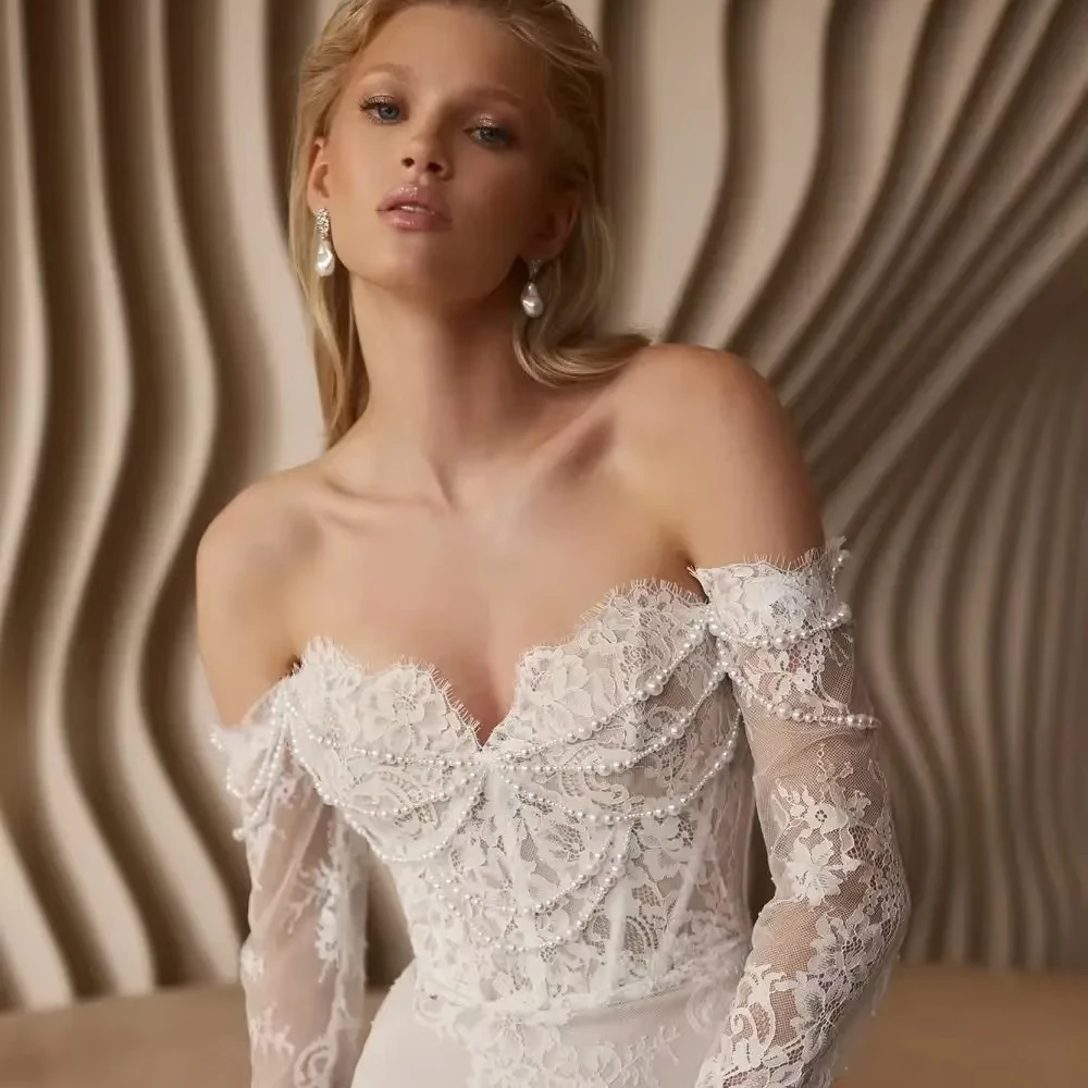 فساتين زفاف مثيرة مخصصة من الدانتيل حورية البحر للنساء لؤلؤ على شكل قلب ورقبة على شكل قلب وأكمام طويلة فستان زفاف فيستدوس فستان زفاف